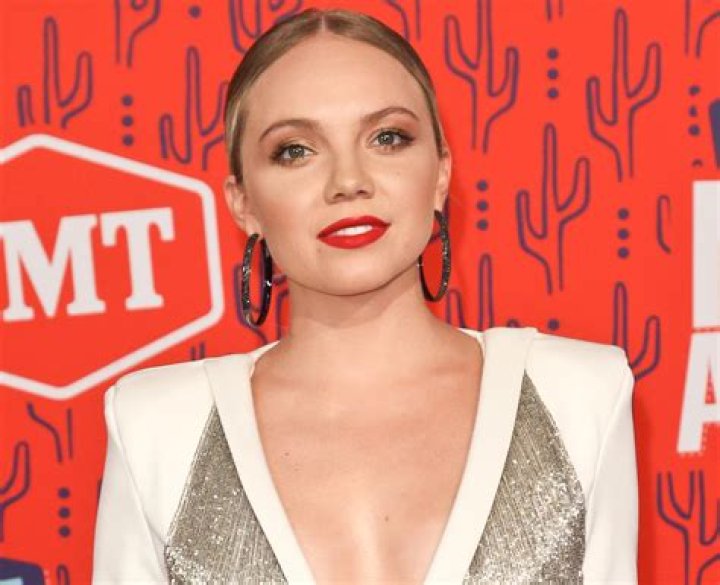 Danielle Bradbery Shows Off Toned Figure in Black Workout Pants and a Tank Top on Tour — Celebwell