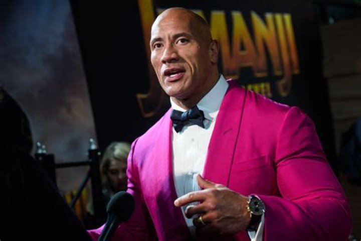 Dwayne Johnson pays tribute to his own success with a meme that went stale three years ago