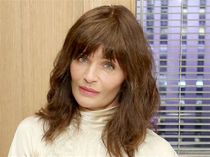 Helena Christensen in Bathing Suit Swims in Snowy "Beach" — Celebwell