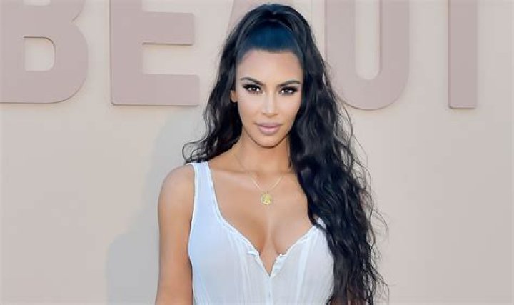 Kim Kardashian in Bathing Suit Soaks Up "Vitamin Sea" — Celebwell