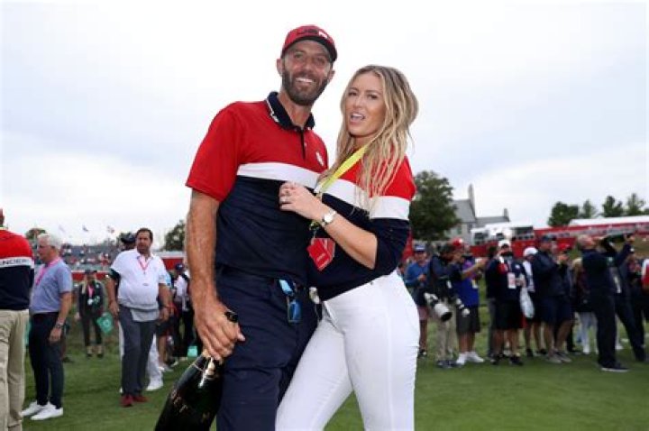 How much is Dustin Johnson wife worth?