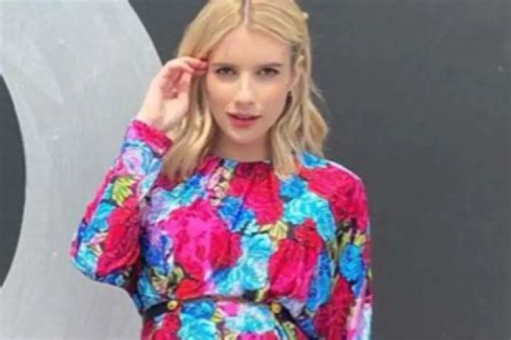 Pregnant Emma Roberts Displays Her Baby Bump In Versace Mini Dress As She Teases Upcoming Project