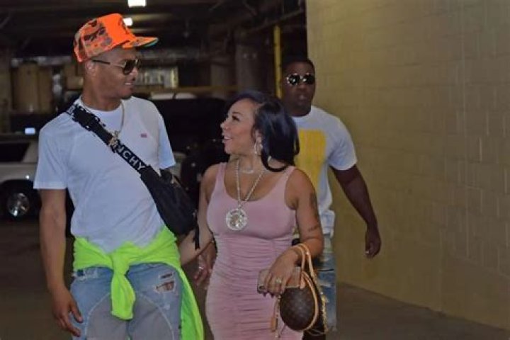 Tiny Harris Forces Hater To Delete Mean Comment About T.I.’s Tight Pants After She Posted These Pictures Of Rapper In Jeans With Sweatpants Hem