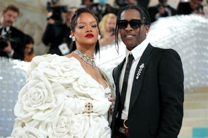 When Holding Hands With Her Boyfriend A$AP Rocky, Rihanna Looks Stunning With A Shiny Corset Top And Cones Bra