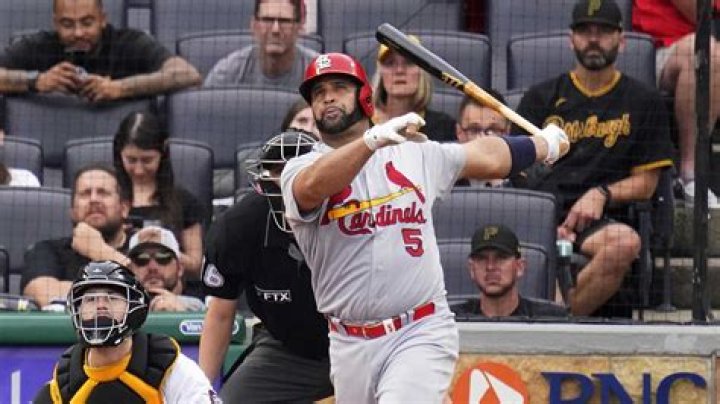 Where did Albert Pujols go to college and high school?