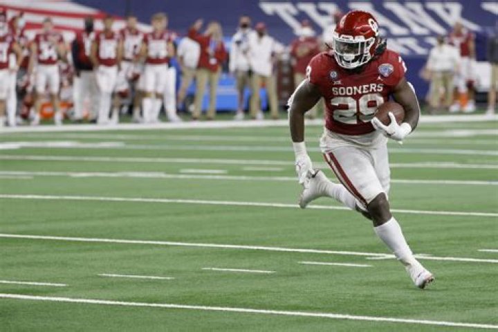 Where did Rhamondre Stevenson go to college? Did Rhamondre Stevenson play college football?